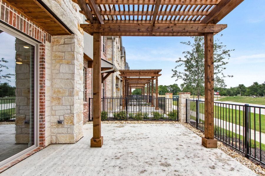 Exterior details and patio area of a home in The Tribute, The Colony (Image 3). Exterior details and patio area of a home in The Tribute, The Colony (Image 3).