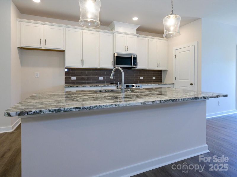 Furnished interior view inside a new home in Central Living at Craig, Charlotte (Image 5).