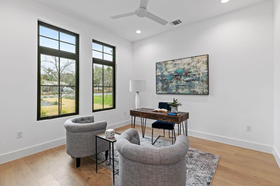 Office featuring recessed lighting, a ceiling fan, light wood finished floors, and baseboards