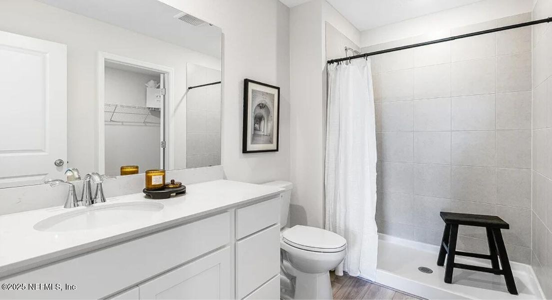 Furnished interior view inside a new home in Holstein Crossing, Green Cove Springs (Image 8).