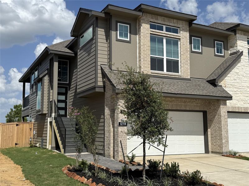 Exterior details and patio area of a home in Bridgeland, Cypress (Image 3).