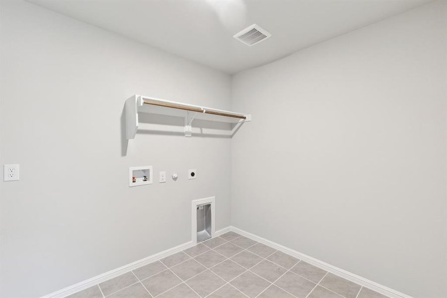 Utility Room in the Harrison home plan by Trophy Signature Homes – REPRESENTATIVE PHOTO Utility Room in the Harrison home plan by Trophy Signature Homes – REPRESENTATIVE PHOTO