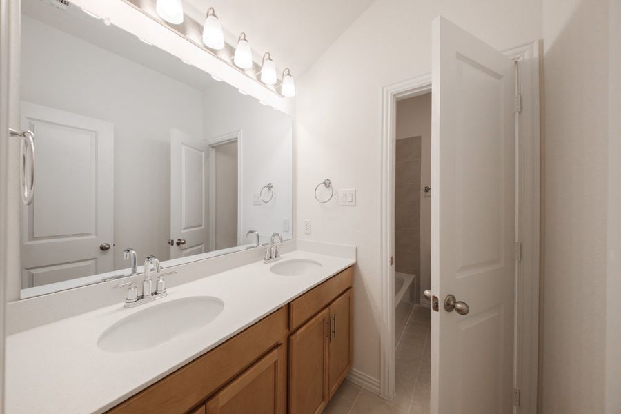 Furnished interior view inside a new home in The Villages of Hurricane Creek, Anna (Image 10).