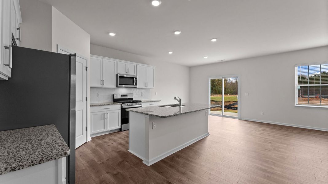 Furnished interior view inside a new home in Beaver Dam Crossing, Bailey (Image 6).