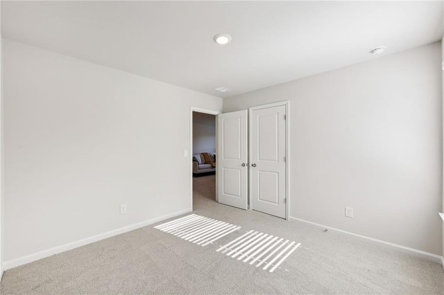 Spacious, unfurnished interior of a new home in Westmont Preserve, Powder Springs (Image 24).