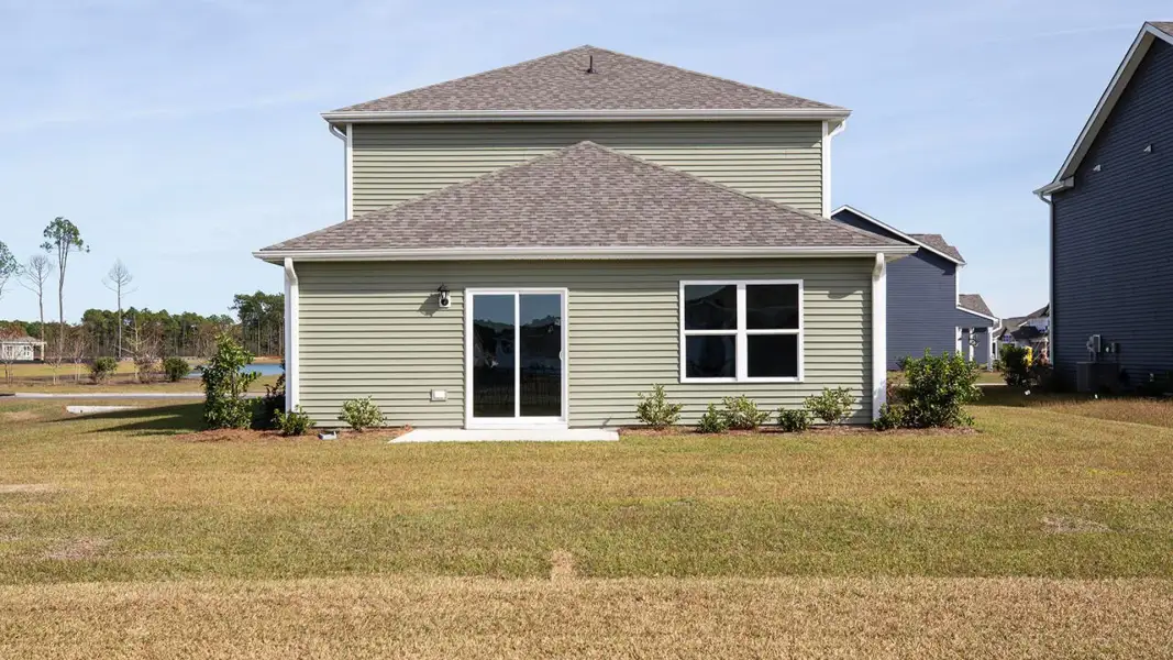 Exterior details and patio area of a home in Saunders Village, Northwest (Image 3).