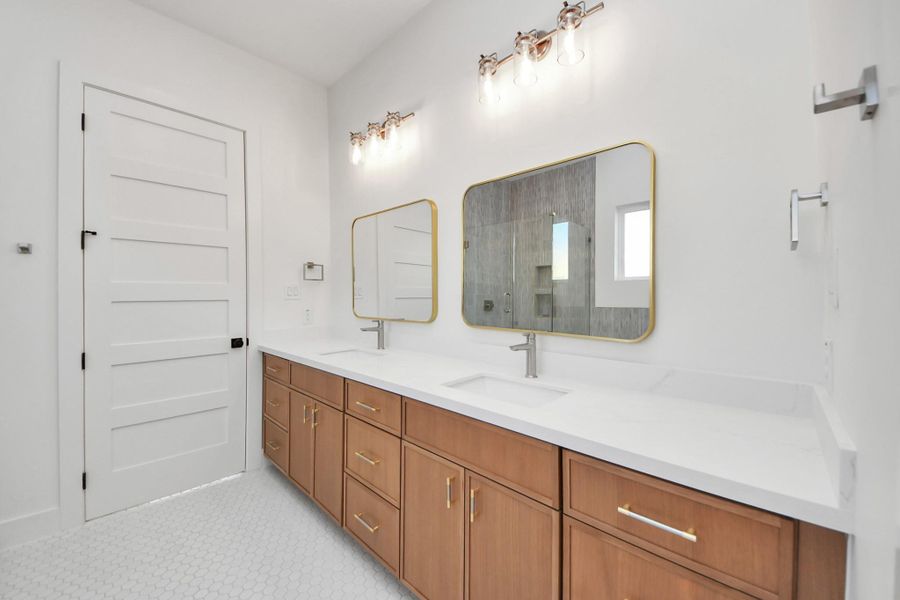 Pictures of model home, corner unit. Listing is of  the 2nd home in the row. Some finishes may vary.