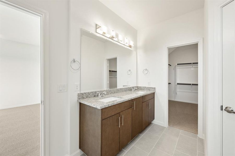 Furnished interior view inside a new home in East Oak Creek Elements, Commerce (Image 7).