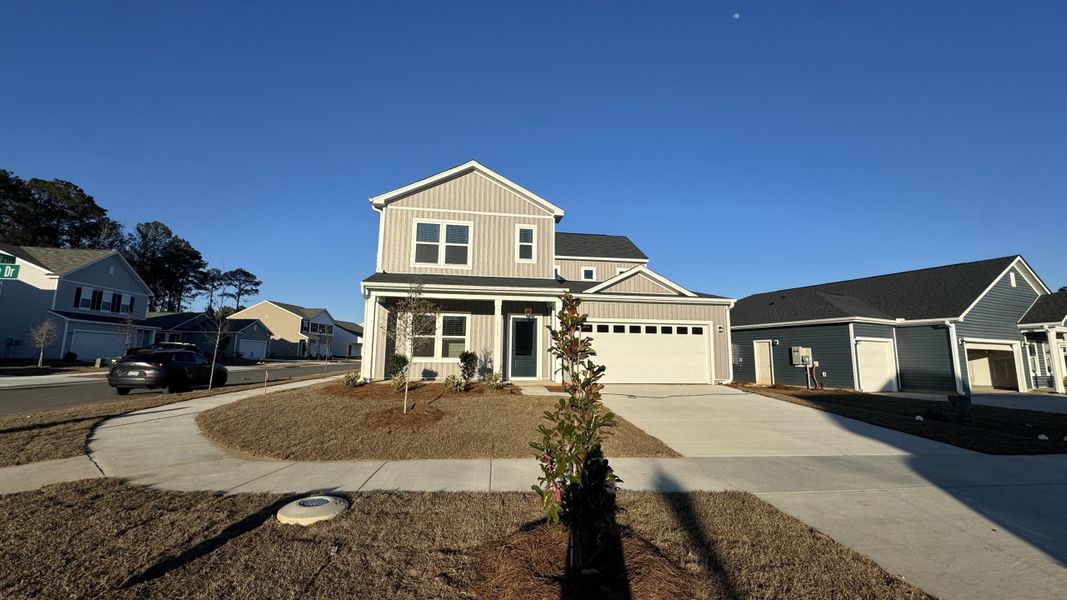 Front exterior of a new home in , Summerville, SC, highlighting curb appeal (Image 2). Front exterior of a new home in , Summerville, SC, highlighting curb appeal (Image 2).