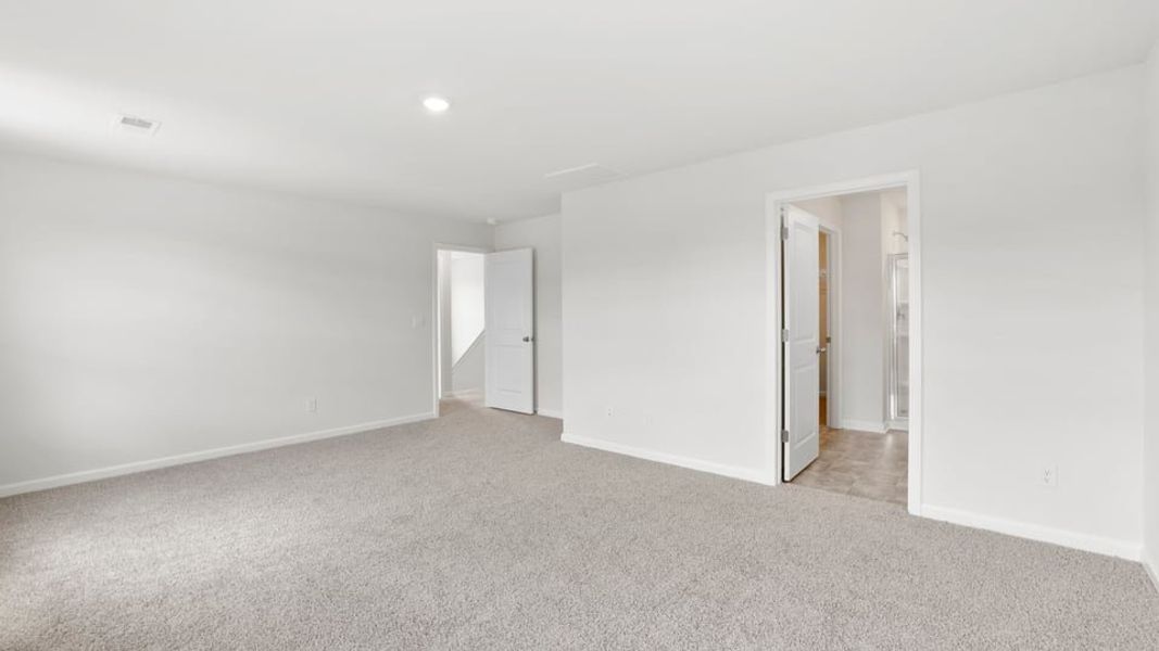 Spacious, unfurnished interior of a new home in Durbin Meadows Traditions, Fountain Inn (Image 34).