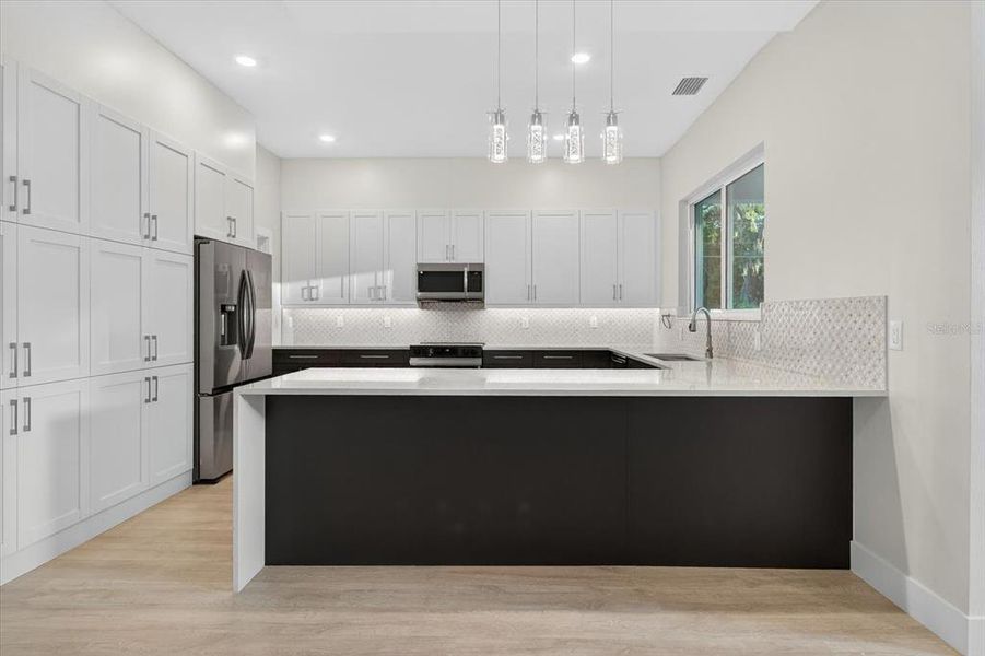 Furnished interior view inside a new home in , Tarpon Springs (Image 12).