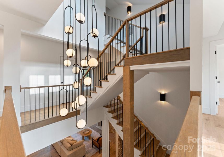 Designer lighting can be experienced throughout the home. View from the second level. Designer lighting can be experienced throughout the home. View from the second level.