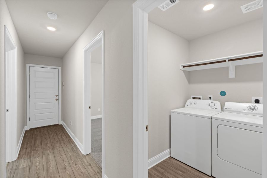 Furnished interior view inside a new home in Sunterra, Katy (Image 9).