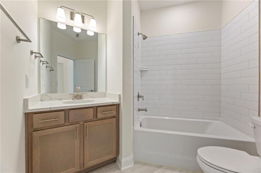 Furnished interior view inside a new home in The Courtyards of Franklin Goldmine, Cumming (Image 4).