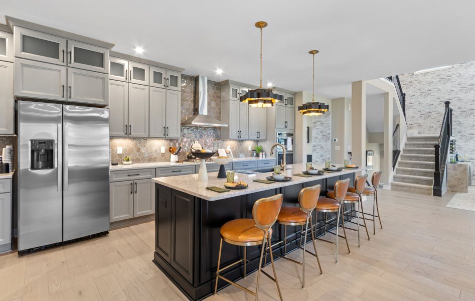 Representative furnished interior of a home built from the Huxley by Fischer Homes in Veranda Manor, Canton (Image 11).