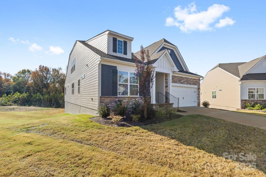 Exterior details and patio area of a home in Bell Farm: 60's, Statesville (Image 25).