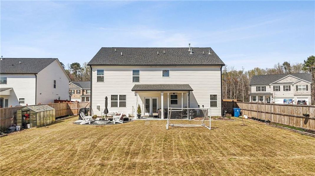 Exterior details and patio area of a home in Independence, Loganville (Image 33).