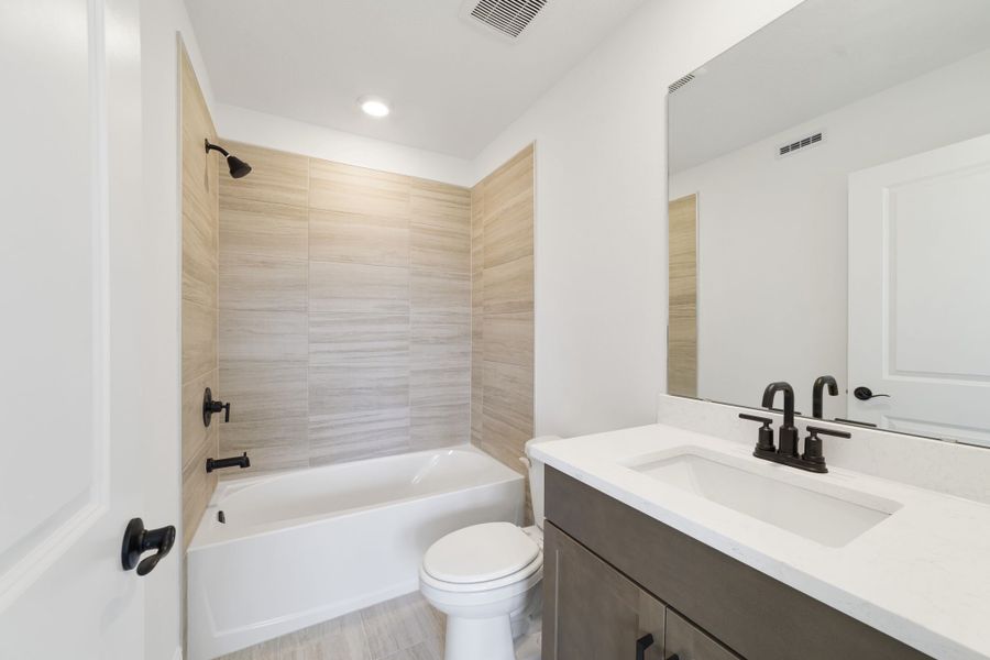 Furnished interior view inside a new home in Vintner Reserve, Clermont (Image 15).