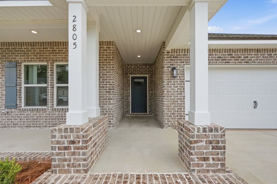 Exterior details and patio area of a home in Barton's Bend, Crestview (Image 3).