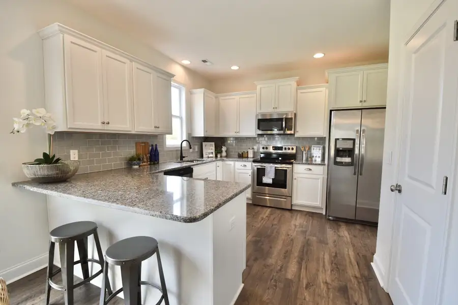 Furnished interior view inside a new home in Patriot’s Watch, Shallotte (Image 4).