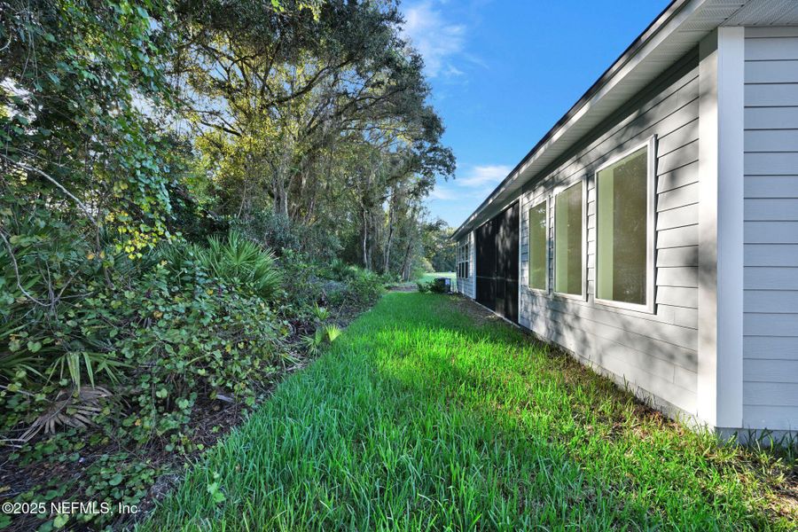 Exterior details and patio area of a home in Landing at Olde Florida, St. Augustine (Image 21).