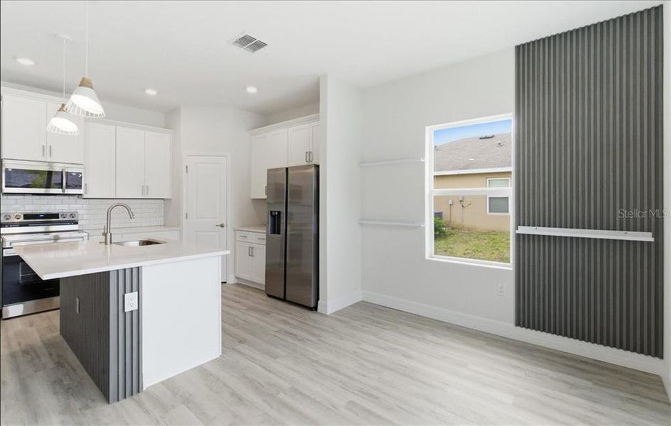 Furnished interior view inside a new home in , North Port (Image 14).