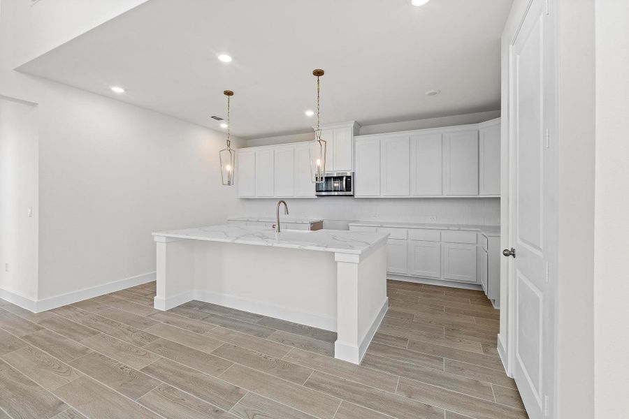 Furnished interior view inside a new home in Parmer Ranch, Georgetown (Image 6).