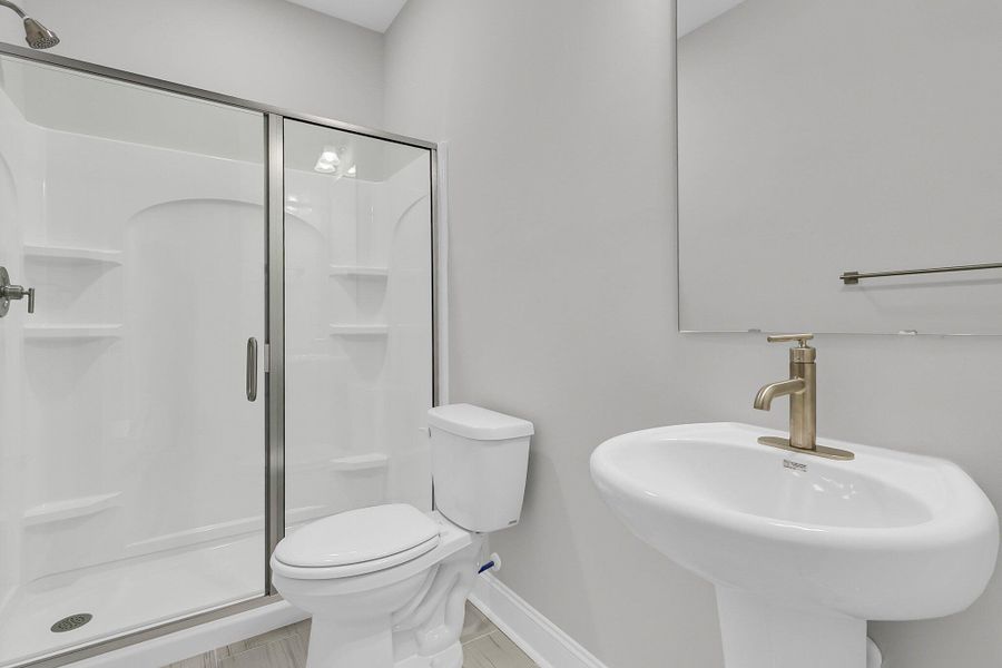 Furnished interior view inside a new home in Tidewater at Lakes of Cane Bay, Summerville (Image 8).