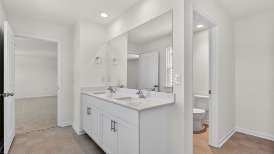 Furnished interior view inside a new home in Shahbain Reserve, Raeford (Image 10).