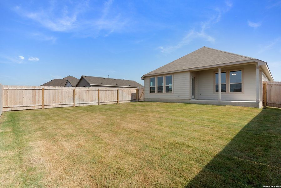 Exterior details and patio area of a home in Prairie Green, Converse (Image 4).