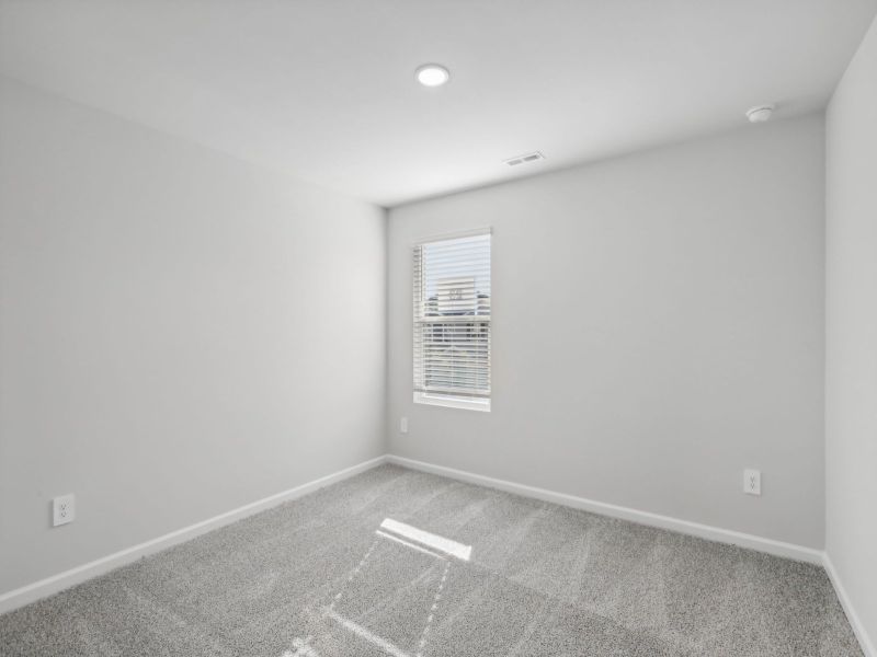 Secondary bedroom in the Chatham floorplan at 250 White Birch Lane in Angier, NC.