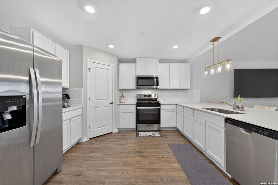 Furnished interior view inside a new home in Riverstone at Westpointe, San Antonio (Image 8).
