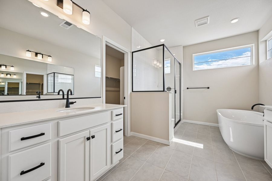Furnished interior view inside a new home in The Aurora Highlands, Aurora (Image 9).
