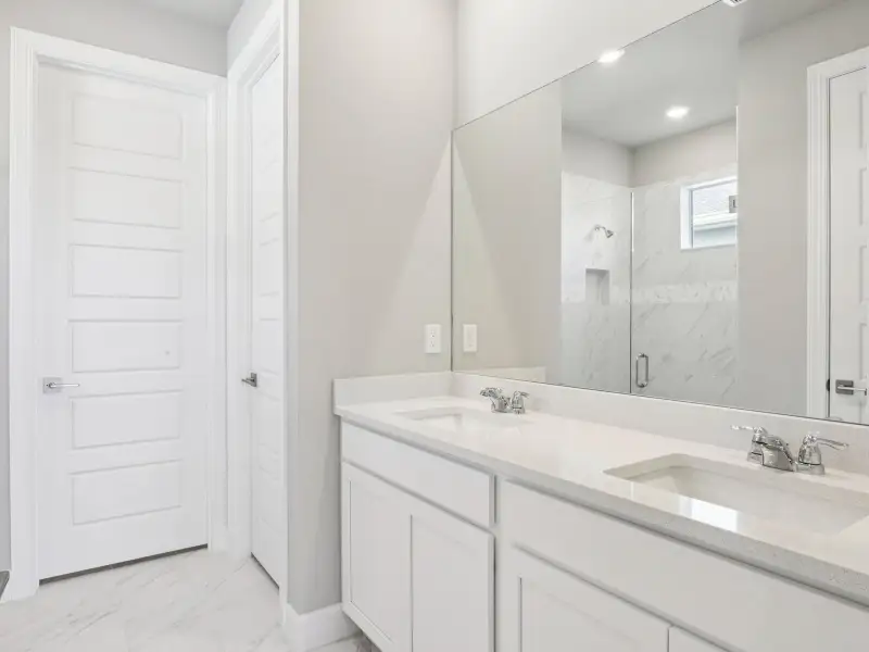 Furnished interior view inside a new home in Crescent Lakes - Reserve Series, Punta Gorda (Image 7).