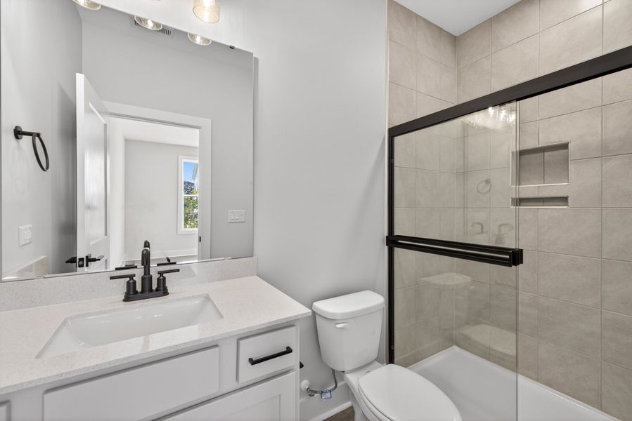 Representative furnished interior of a home built from the Atlas Interior Unit by Baker Residential in Atwater Station - Midtown Collection, Fuquay Varina (Image 16).