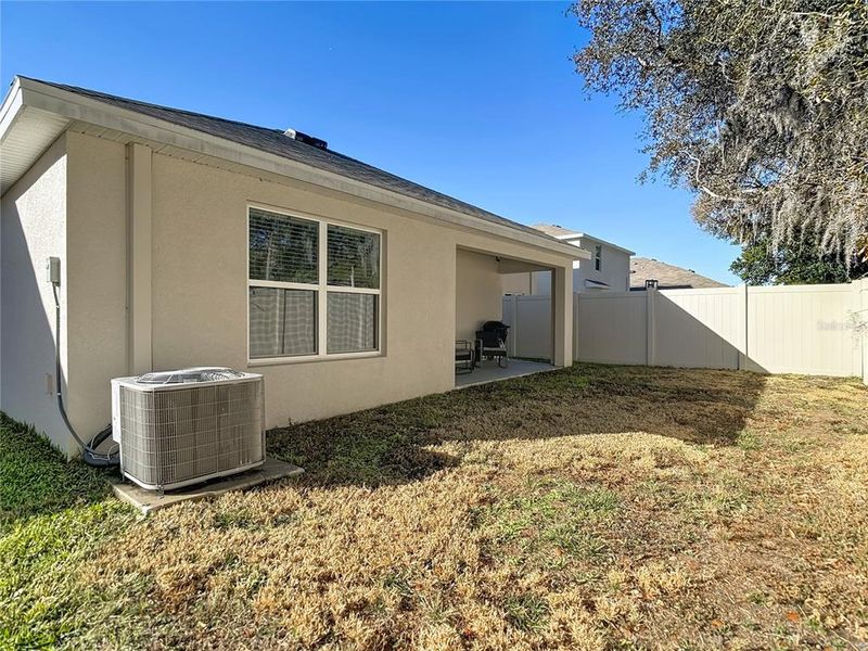 Exterior details and patio area of a home in , Zephyrhills (Image 25).