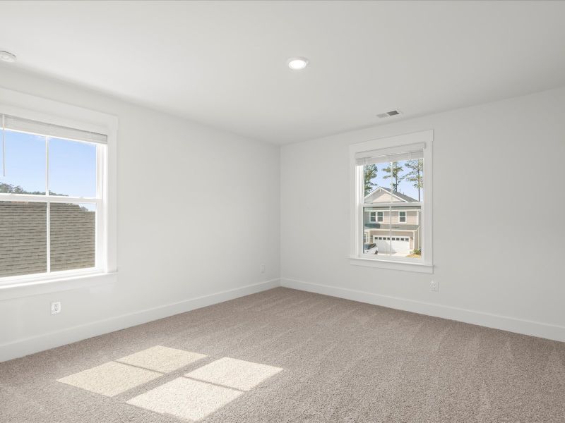 Spacious, unfurnished interior of a new home in The Coves at Lakes of Cane Bay, Summerville (Image 23). Spacious, unfurnished interior of a new home in The Coves at Lakes of Cane Bay, Summerville (Image 23).