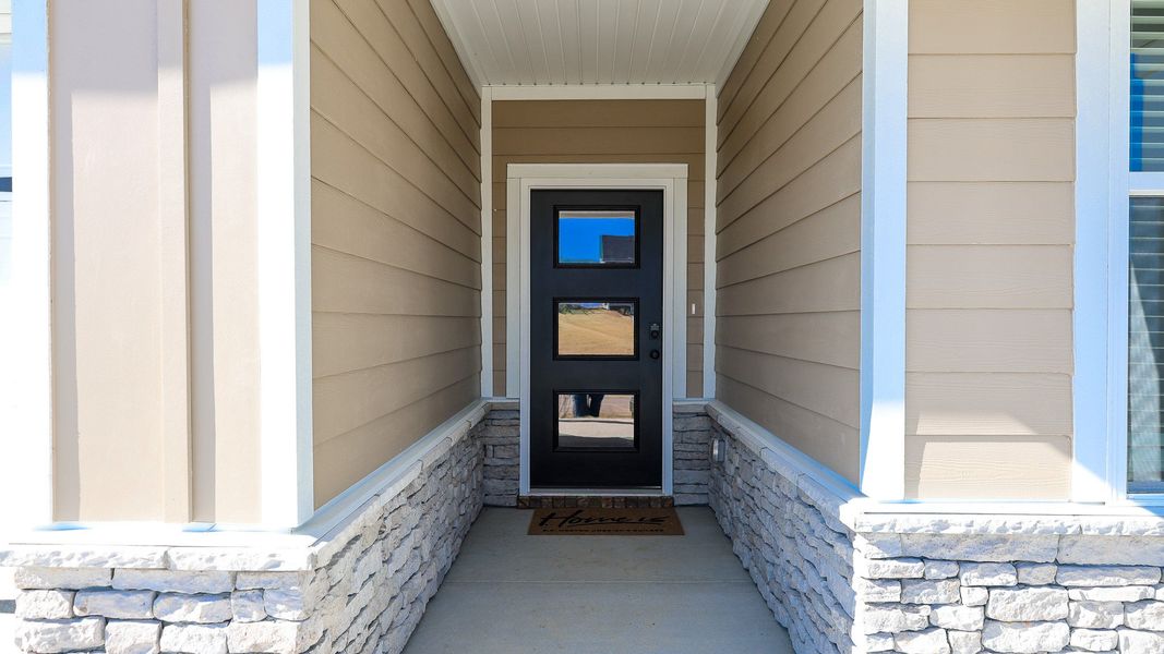 Exterior details and patio area of a home in Nexus South, Gallatin (Image 3).