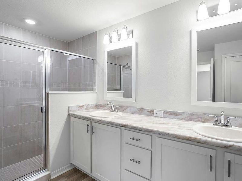 Your suite is complete with two closets and a large en-suite bath.