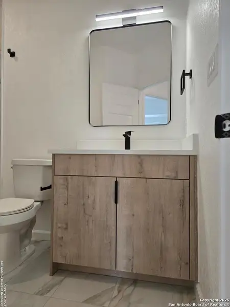 Furnished interior view inside a new home in , San Antonio (Image 6).