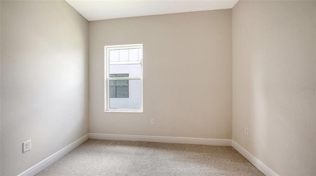 Spacious, unfurnished interior of a new home in Grand Park, Sarasota (Image 32).