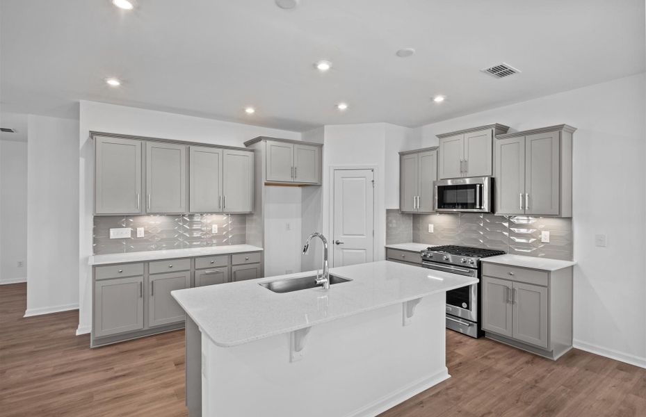 Furnished interior view inside a new home in Parkside Crossing, Charlotte (Image 9). Furnished interior view inside a new home in Parkside Crossing, Charlotte (Image 9).