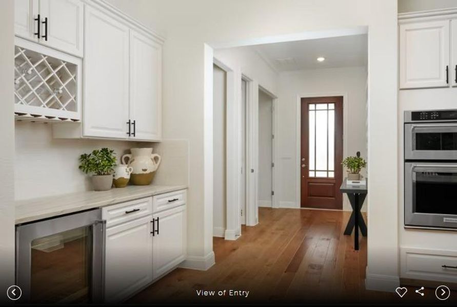 Interior photos- Photo of Del Webb model home with same floor plan, not of actual home listed.