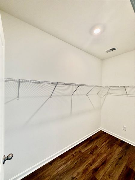 Rich hardwood flooring and integrated wire shelvin