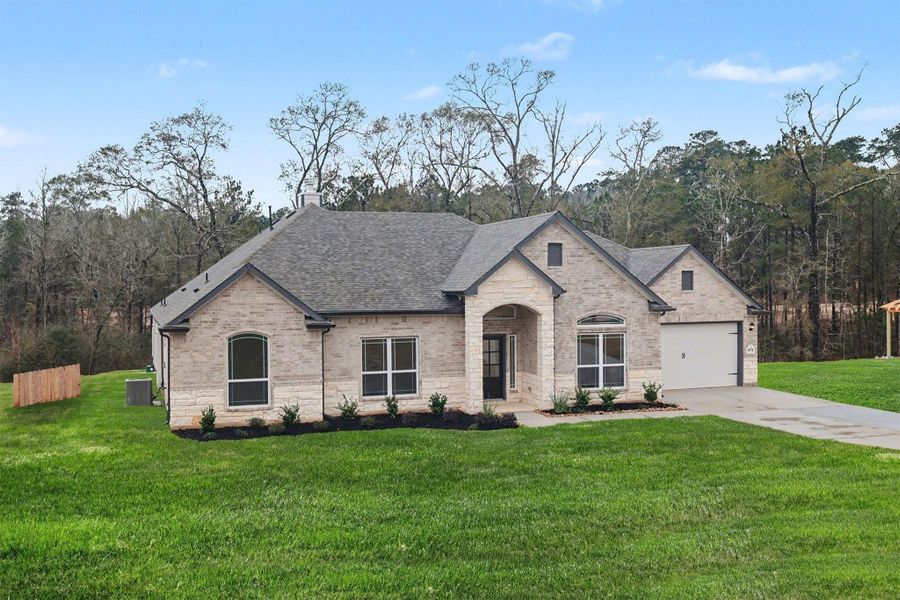 Front exterior of a new home in Rose Hill Estates, Willis, TX, highlighting curb appeal (Image 18).