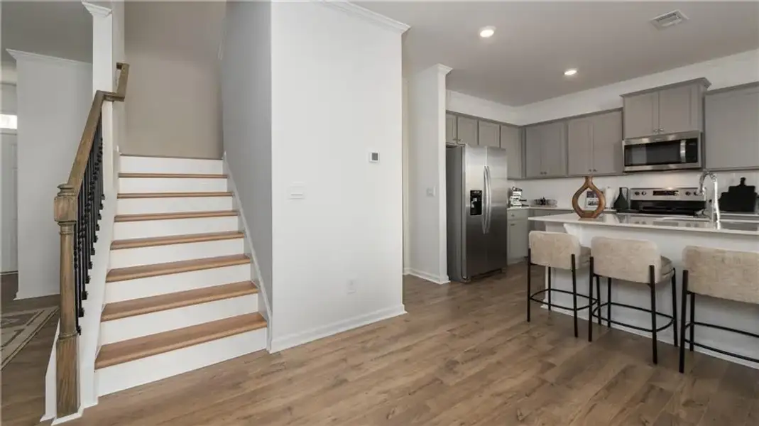 Furnished interior view inside a new home in Harvest Park, Decatur (Image 15).
