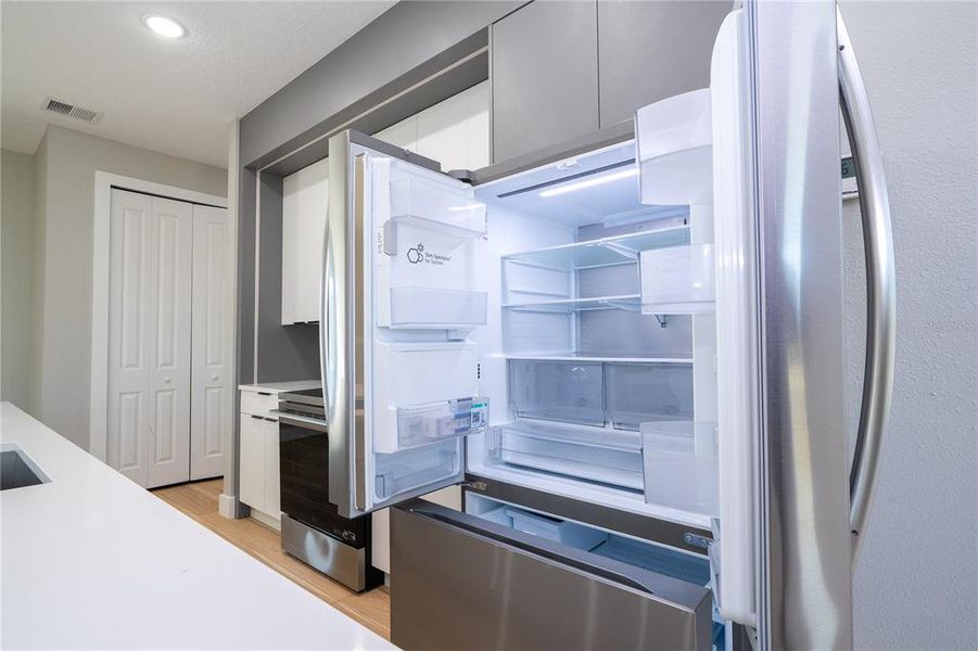 Furnished interior view inside a new home in , Port Charlotte (Image 9). Furnished interior view inside a new home in , Port Charlotte (Image 9).