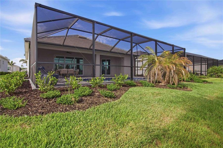 Exterior details and patio area of a home in Calusa Country Club, Lakewood Ranch (Image 3).