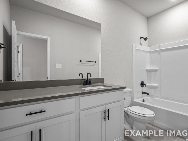 Furnished interior view inside a new home in Hickory Ridge, Elmendorf (Image 10).