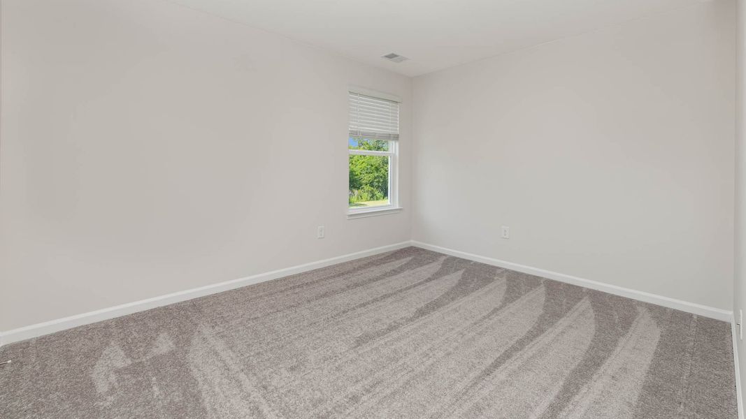 Representative unfurnished interior of a home built from the WREN by D.R. Horton in Cedar Hill Landing, Navassa (Image 28).